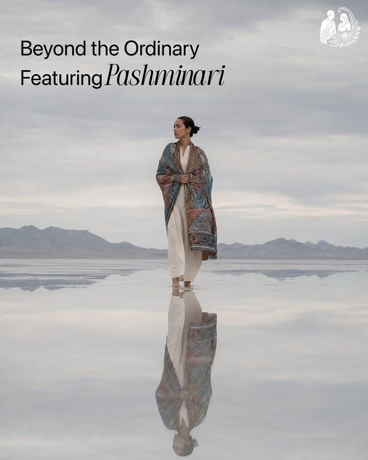 Pashminari fashion campaign, model in a paisley shawl on a salt flat