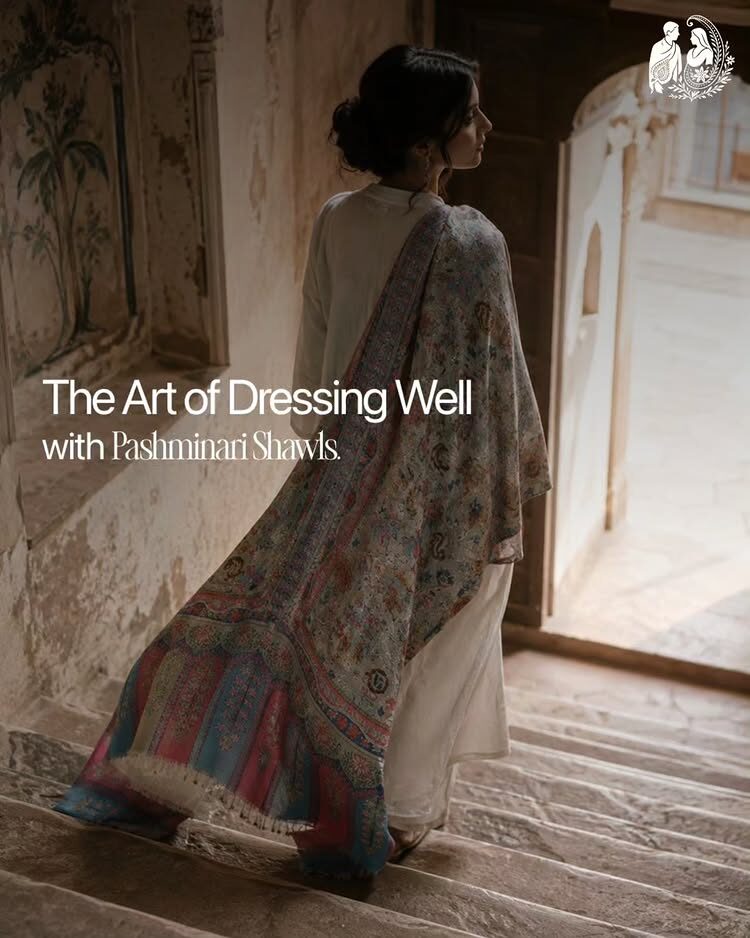Pashminari fashion campaign, model in a shawl on a stairway